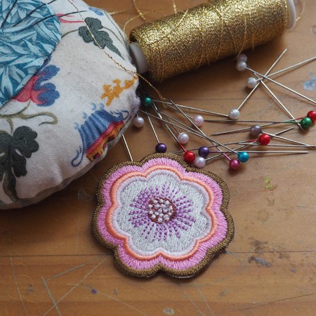 Embroidered iron-on patch with Pink Pop Flower pattern